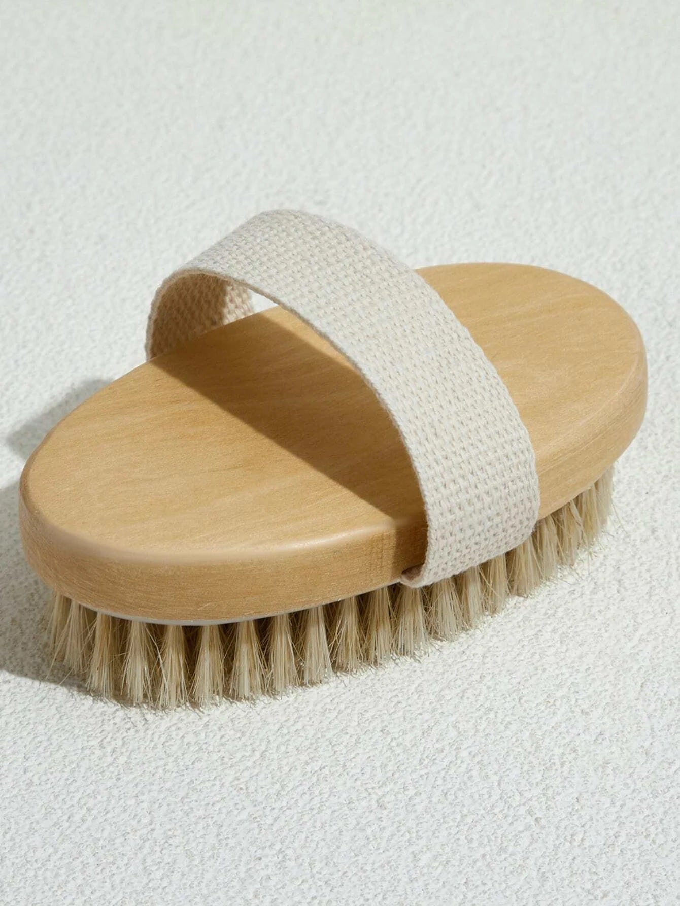 <img src="dry-brush.jpg" alt="Bamboo Dry Body Brush with natural bristles, designed for exfoliation and lymphatic drainage">