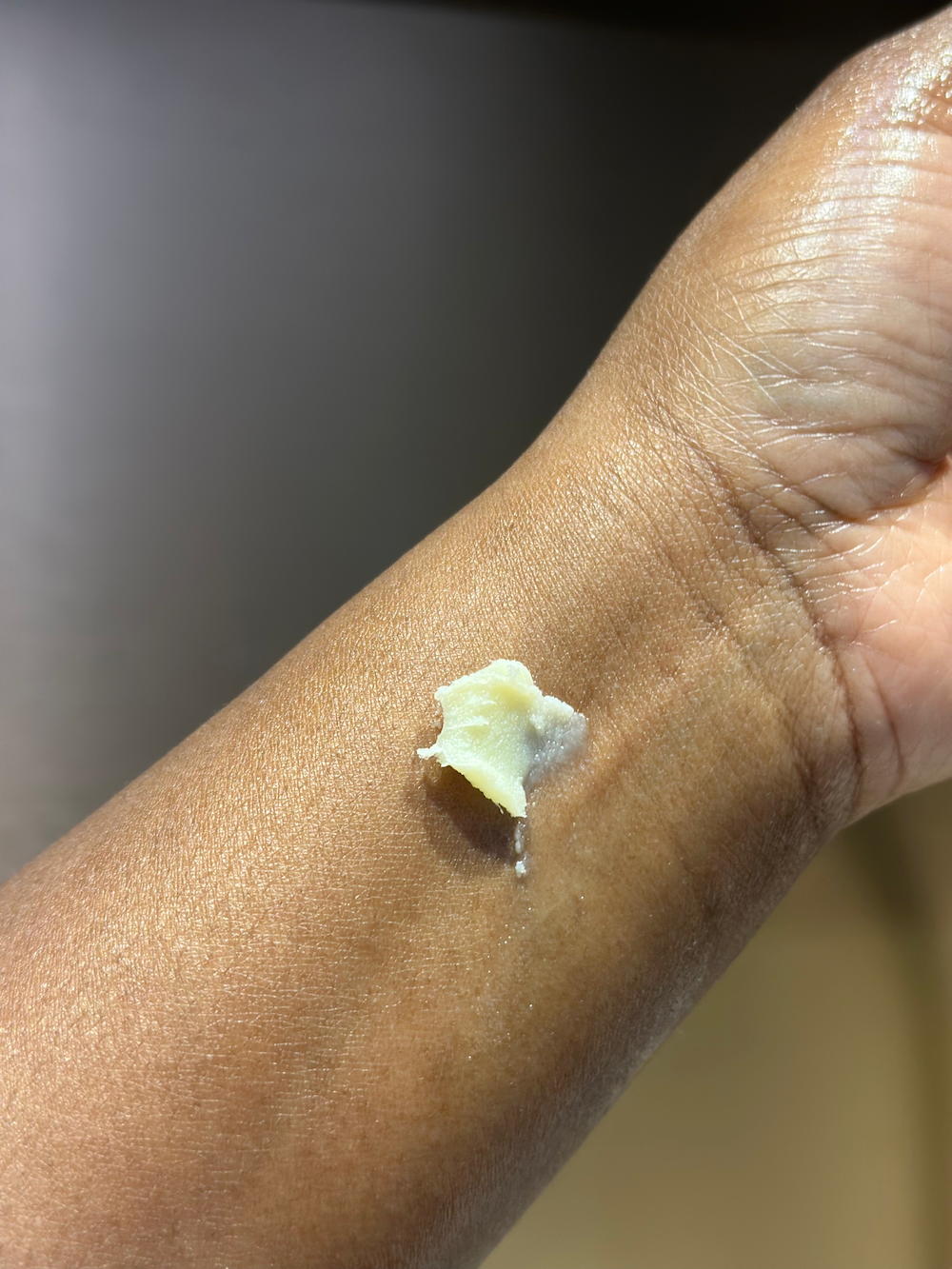 alt=Vegan and cruelty-free Shea Butter Balm, made with ethically sourced ingredients for nourishing dry skin and dark spots
