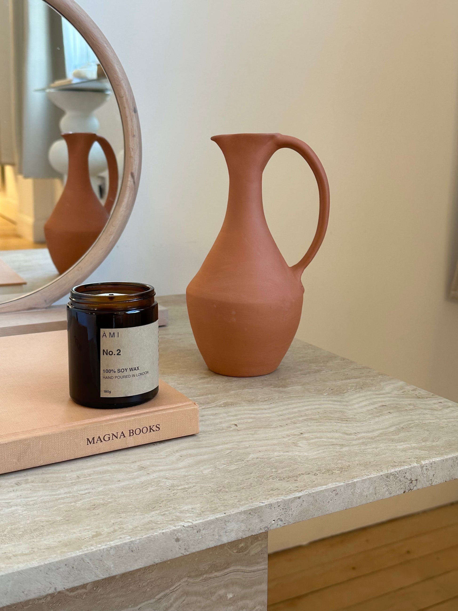 Luxurious scented soy wax candle with a blend of vanilla, musk, sandalwood, jasmine, lavender, orange, lemon, and grapefruit. Hand-poured in London with eco-friendly soy wax and lead-free cotton wick. Available in 180g and 500g sizes, burning for up to 40 and 50 hours respectively.